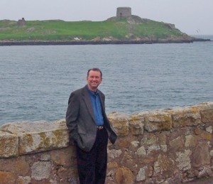 Mick at seawall on Irish Sea